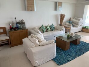 Apartment | Living room | Flat-screen TV - JUUB Acapulco, Exclusive Beachfront Apartment (Acapulco)