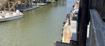 LOCATION, LOCATION,  TOTALLY  RENOVATED, ON THE WATER, TWO 28' COVERED SLIPS
