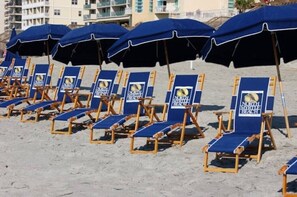Rows of beach chairs and umbrellas at North Myrtle Beach. - BeachHouse, Walk to Beach, Family-Friendly, Mins. to Attractions Golf Waterparks (North Myrtle Beach)
