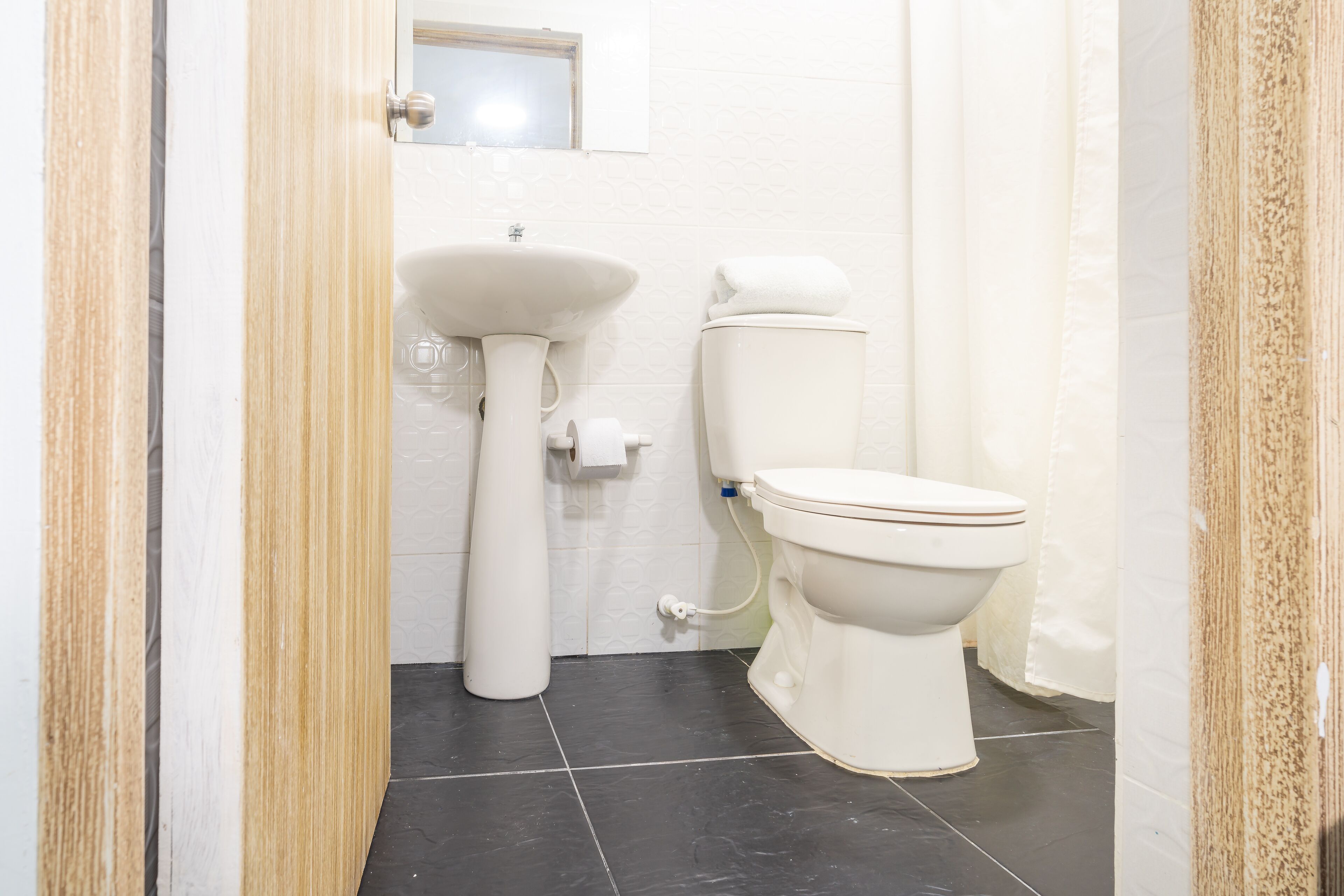 Foto - Ayenda Malaki