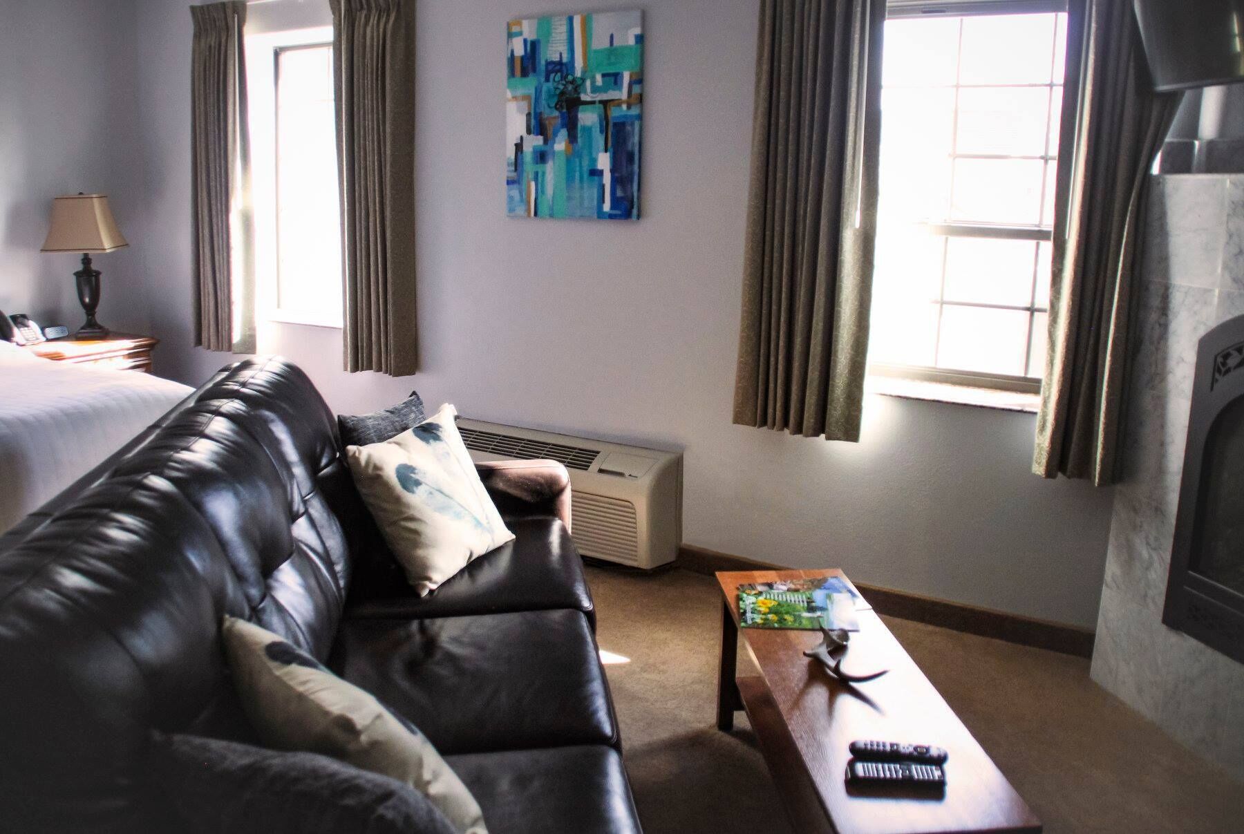 luxury room | premium bedding, pillow-top beds, blackout curtains, iron/ironing board