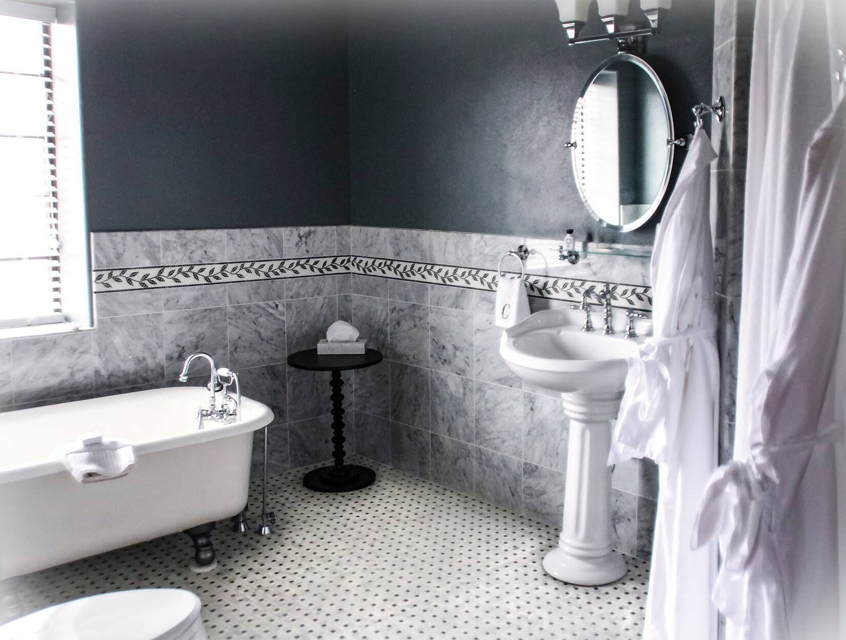 luxury room | bathroom | designer toiletries, hair dryer, towels