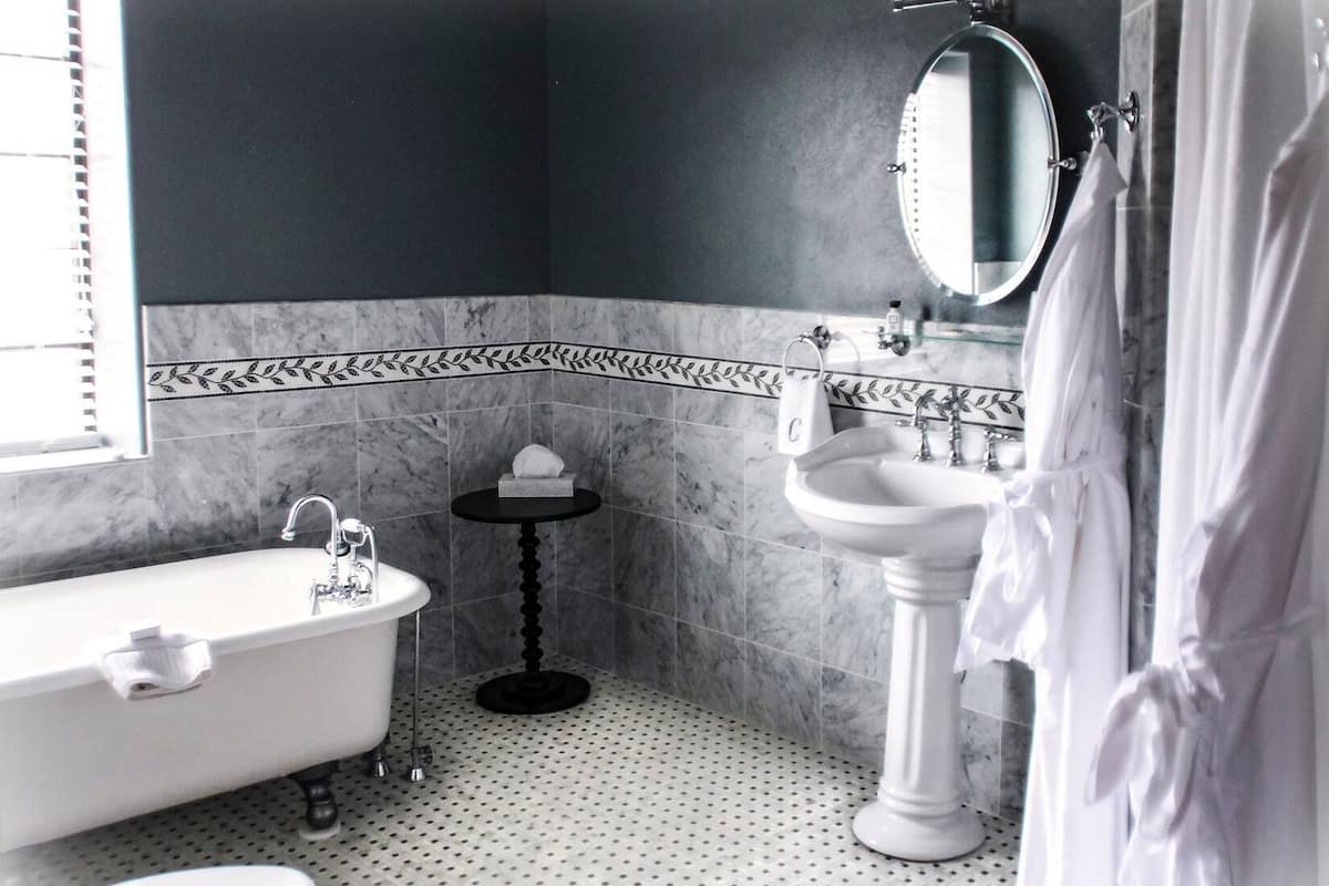 luxury room | bathroom | designer toiletries, hair dryer, towels