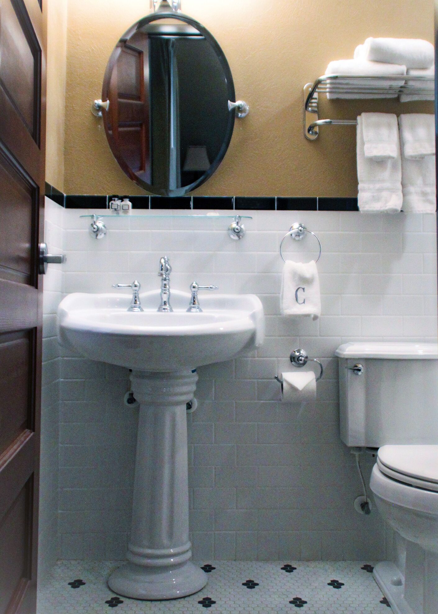 signature room | bathroom | designer toiletries, hair dryer, towels