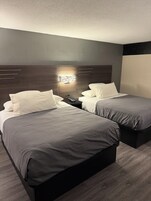 Double Queen Suites | Egyptian cotton sheets, premium bedding, down comforters, desk
