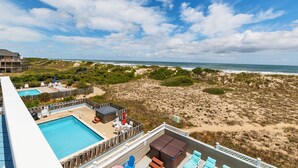A rooftop pool area with a view of the beach and ocean. - OCEANFRONT, Ocean Views, Private Pool, Pool Table, Dogs Welcome, OS7Q, Dune Nothin (Corolla)