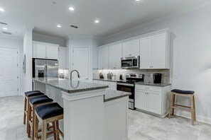 Fridge, microwave, coffee/tea maker, toaster