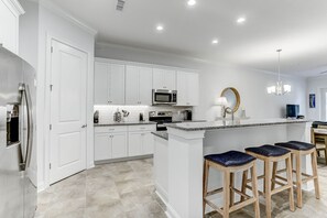 Fridge, microwave, coffee/tea maker, toaster