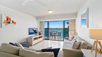 Apartment, 2 Bedrooms | Living area | 55-inch flat-screen TV with digital channels, TV