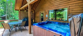 Hot tub, Log Fireplace, Large Fire pit, large decks. 
