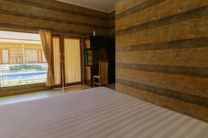 Deluxe Double Room with Pool View | Minibar, desk, soundproofing, free WiFi - Manik Homestay Uluwatu (Pecatu)