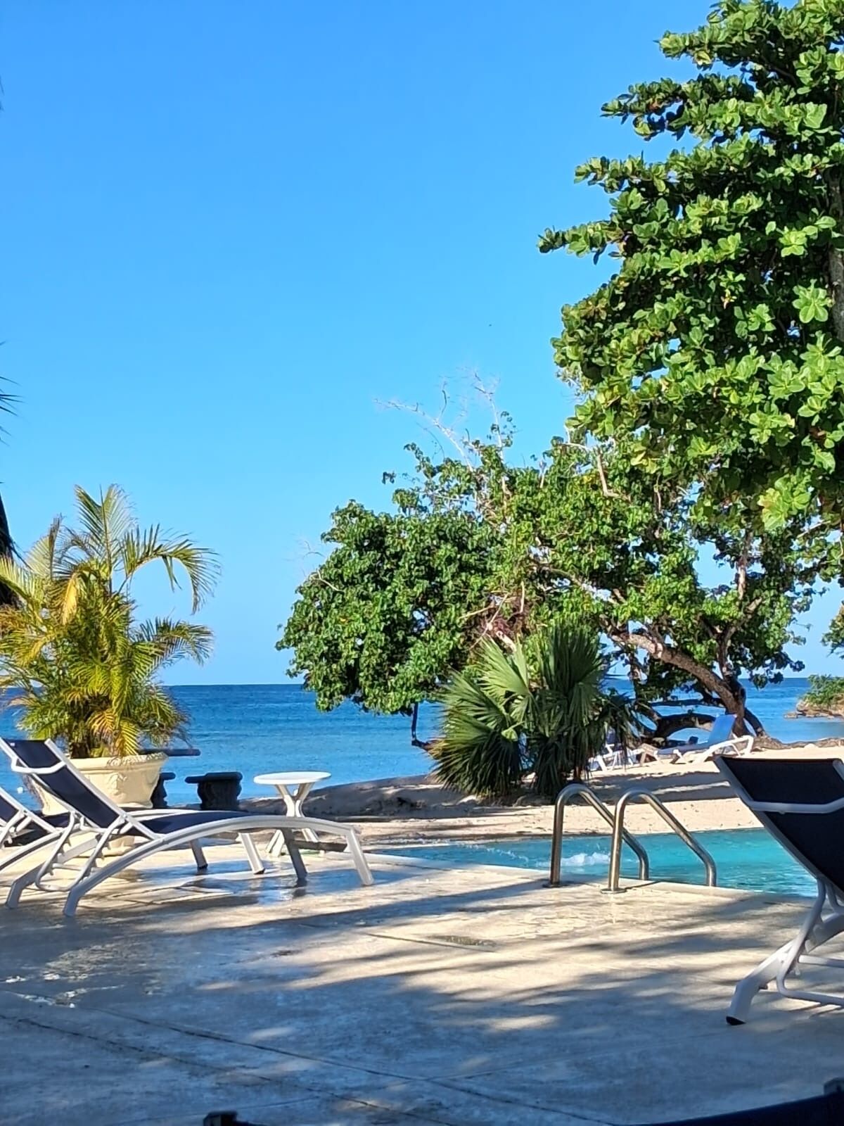 Beautiful house in a gated community. Located on the beach steps from large pool