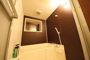 Apartment | Bathroom | Separate tub and shower, hair dryer, slippers, towels