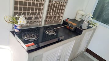 Fridge, coffee/tea maker, electric kettle, cookware/dishes/utensils