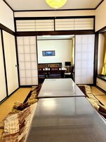 Private villa [Mitsuba House] Max 16 guests, Non Smoking | Living area | 21-inch TV with cable channels, table tennis, toys