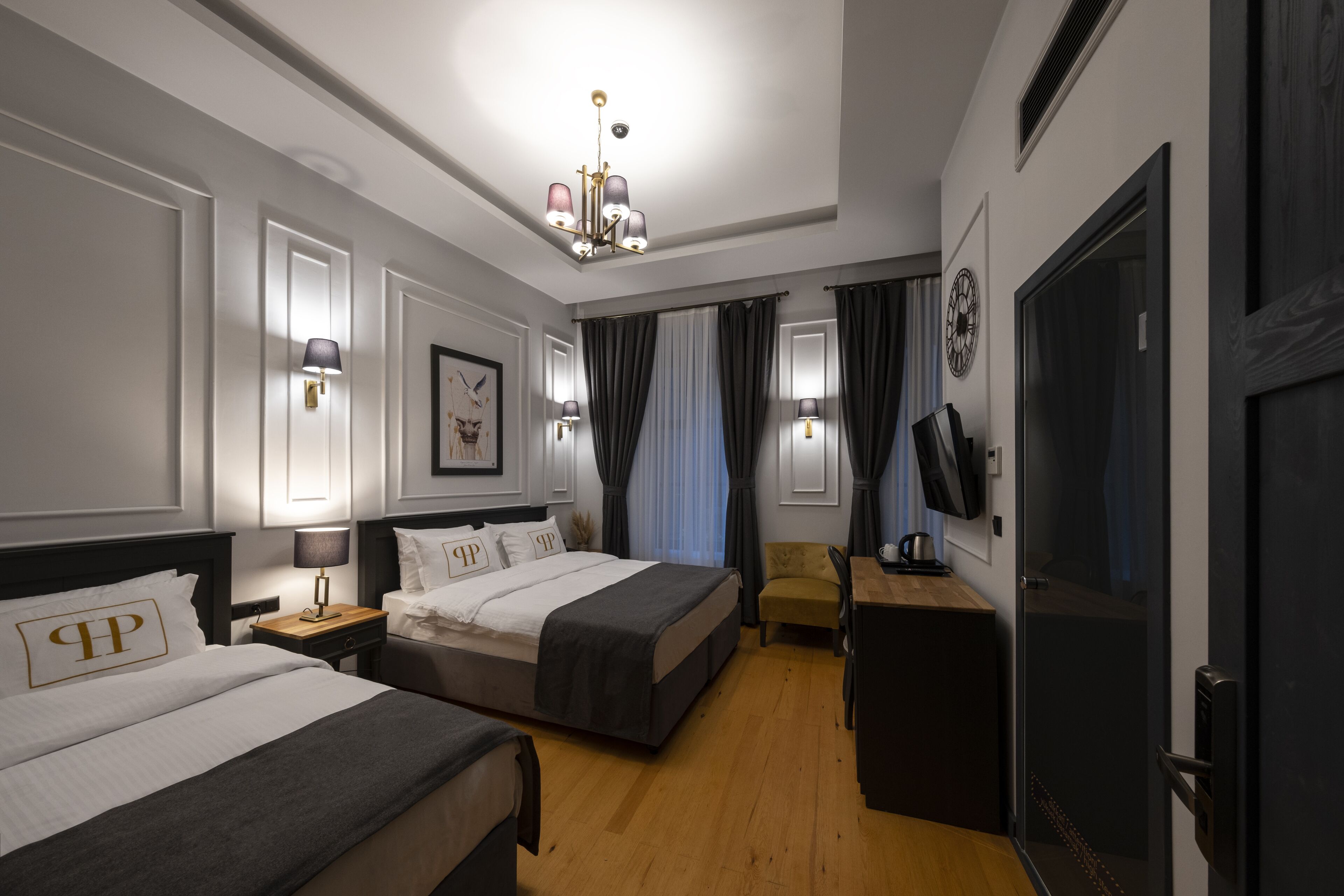 deluxe triple room | 1 bedroom, minibar, in-room safe, individually decorated