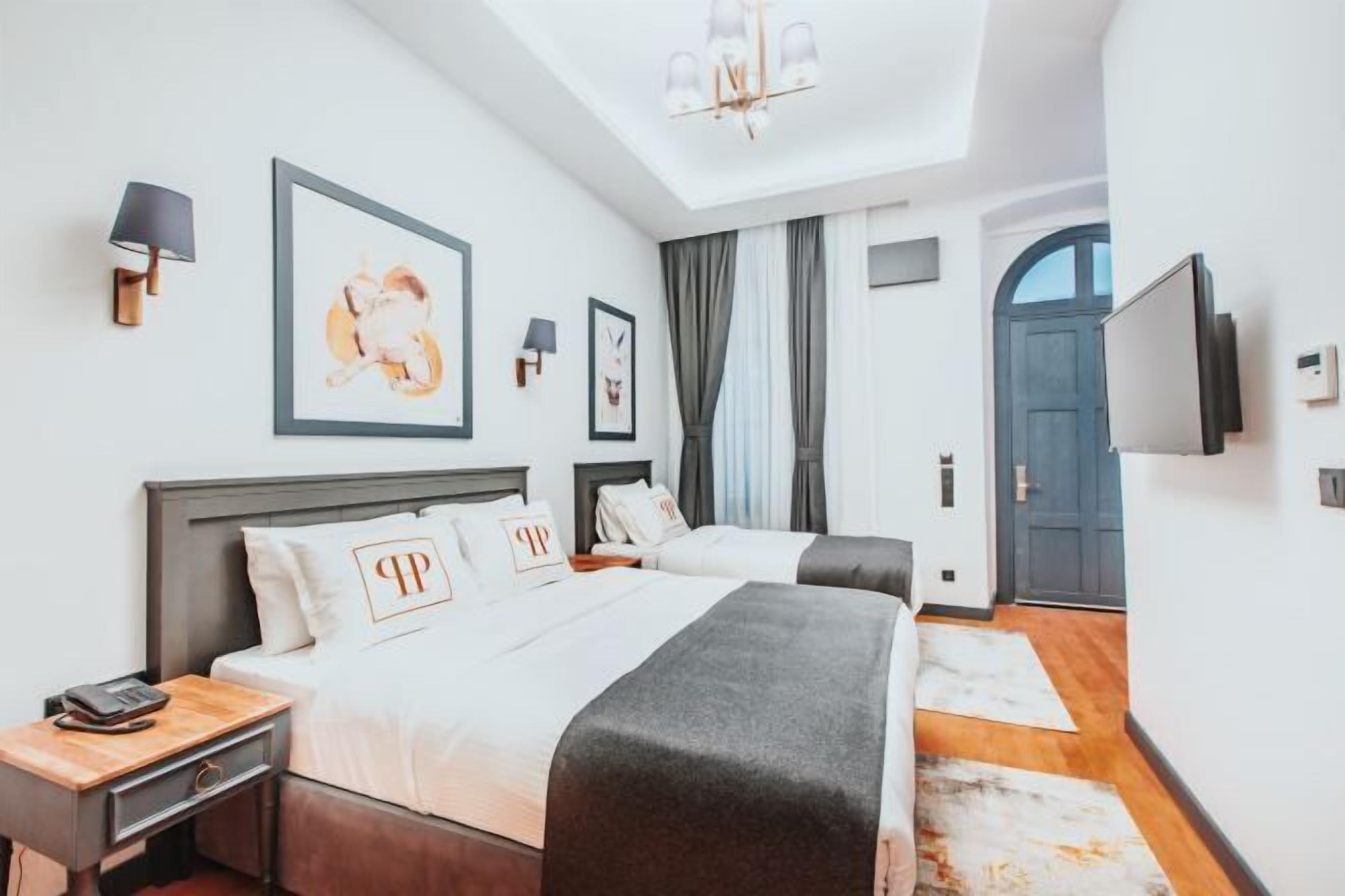 Minibar, safe på rommet, individuelt dekorert og individuelt innredet