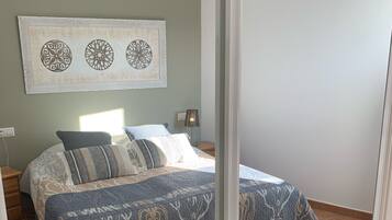 2 dormitorios, tabla de planchar con plancha, wifi y ropa de cama