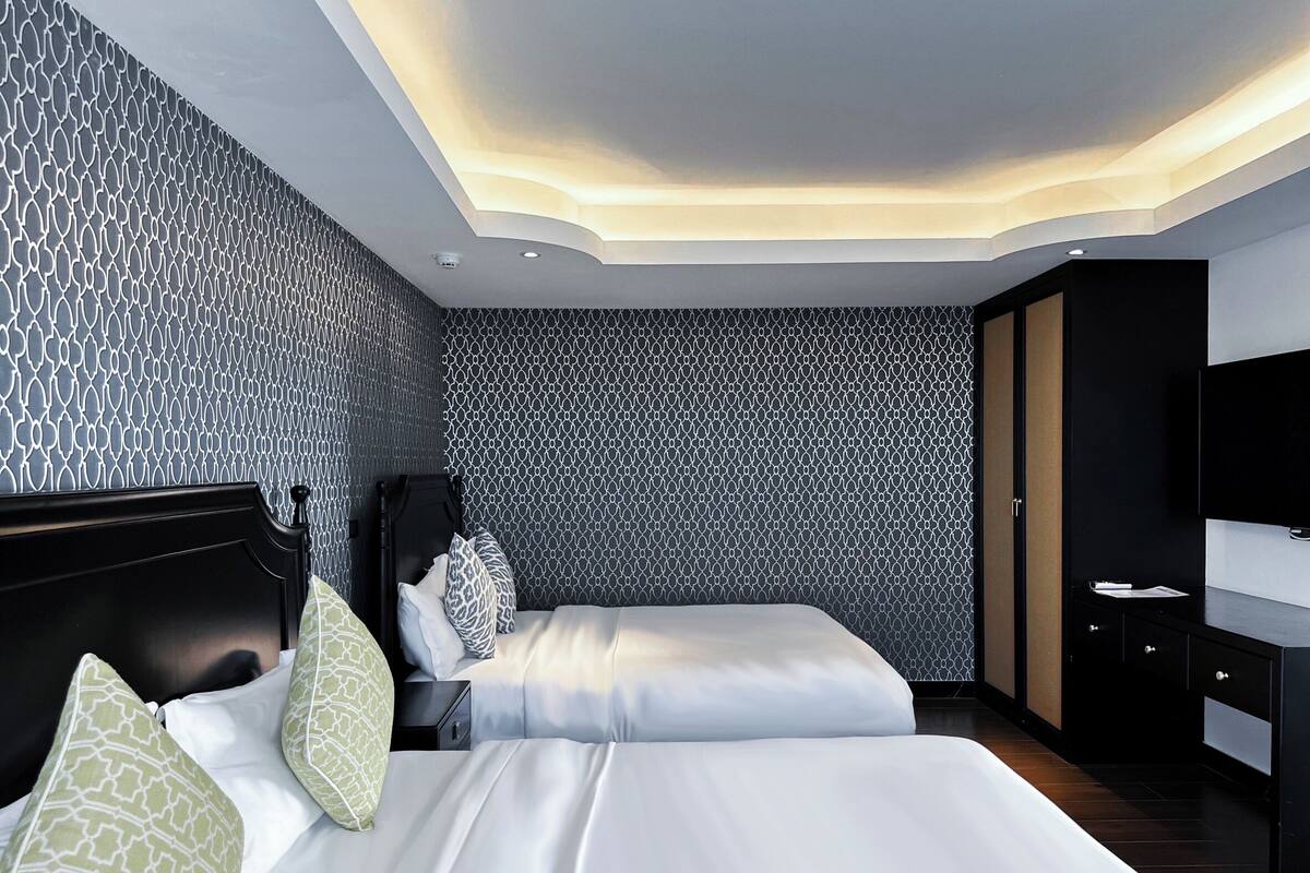 Family Suite | Minibar, sistema de insonorización, wifi gratis y ropa de cama
