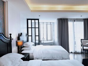 Standaard tweepersoonskamer | Een minibar, geluiddichte muren, gratis wifi, beddengoed