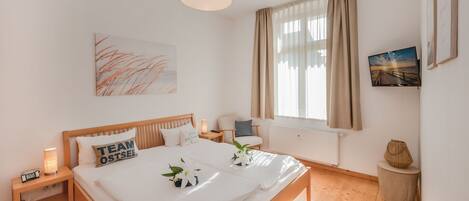 2 slaapkamers, een kluis op de kamer, een strijkplank/strijkijzer