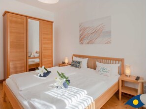 2 bedrooms, in-room safe, iron/ironing board, travel cot