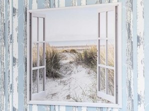 A window with a view of a beach path and dunes. - Vacation beach shell (Wittmund)