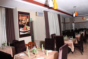 Breakfast, lunch, dinner served; local and international cuisine