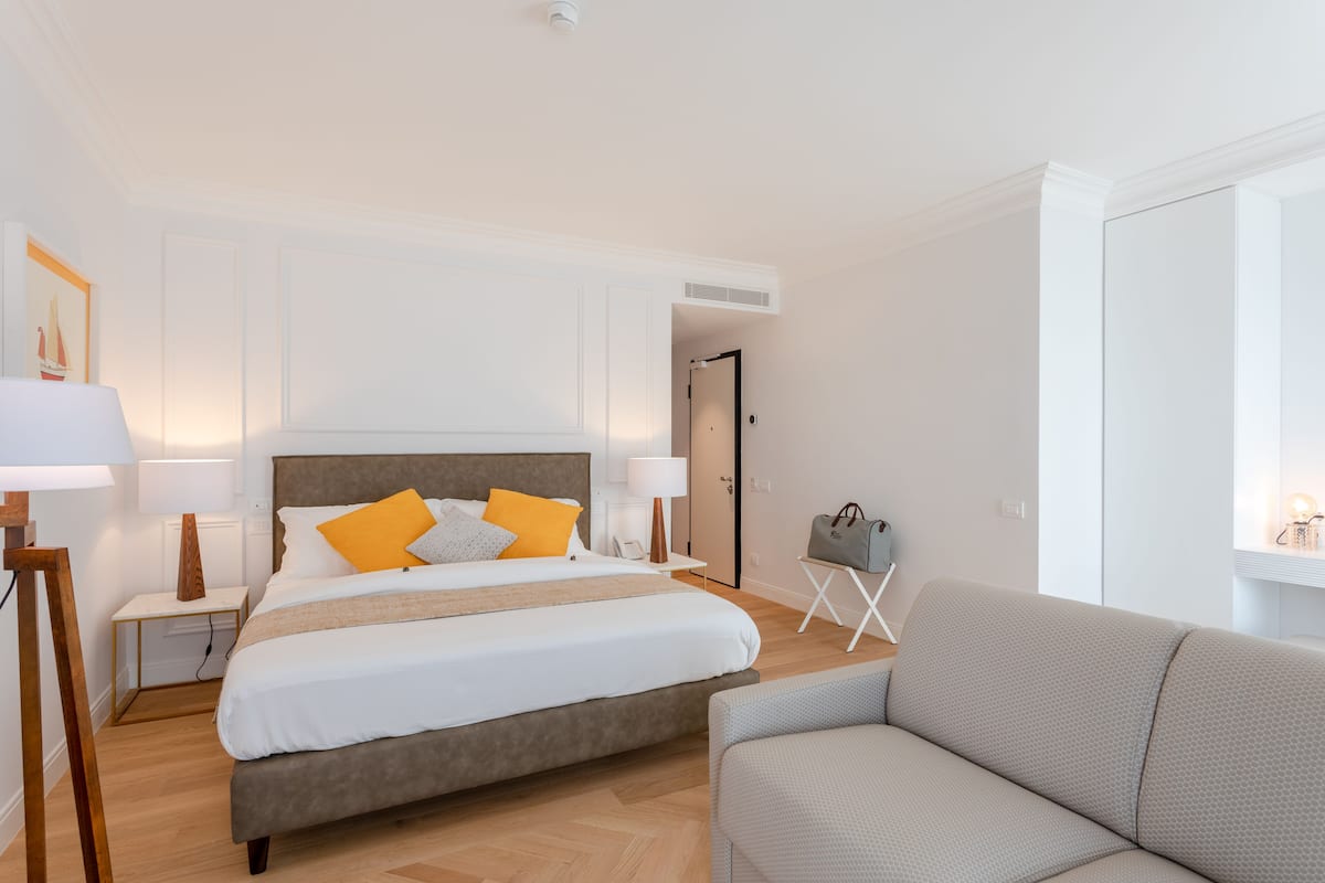 Suite Porto Romano | 1 slaapkamer, donzen dekbedden, een minibar, een kluis op de kamer