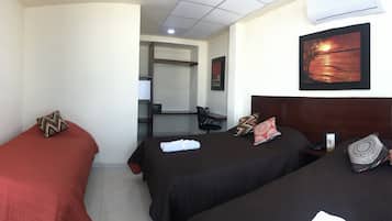 Family Room | Minibar, in-room safe, desk, free WiFi