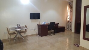 Habitació executiva | Sala d'estar | Televisor