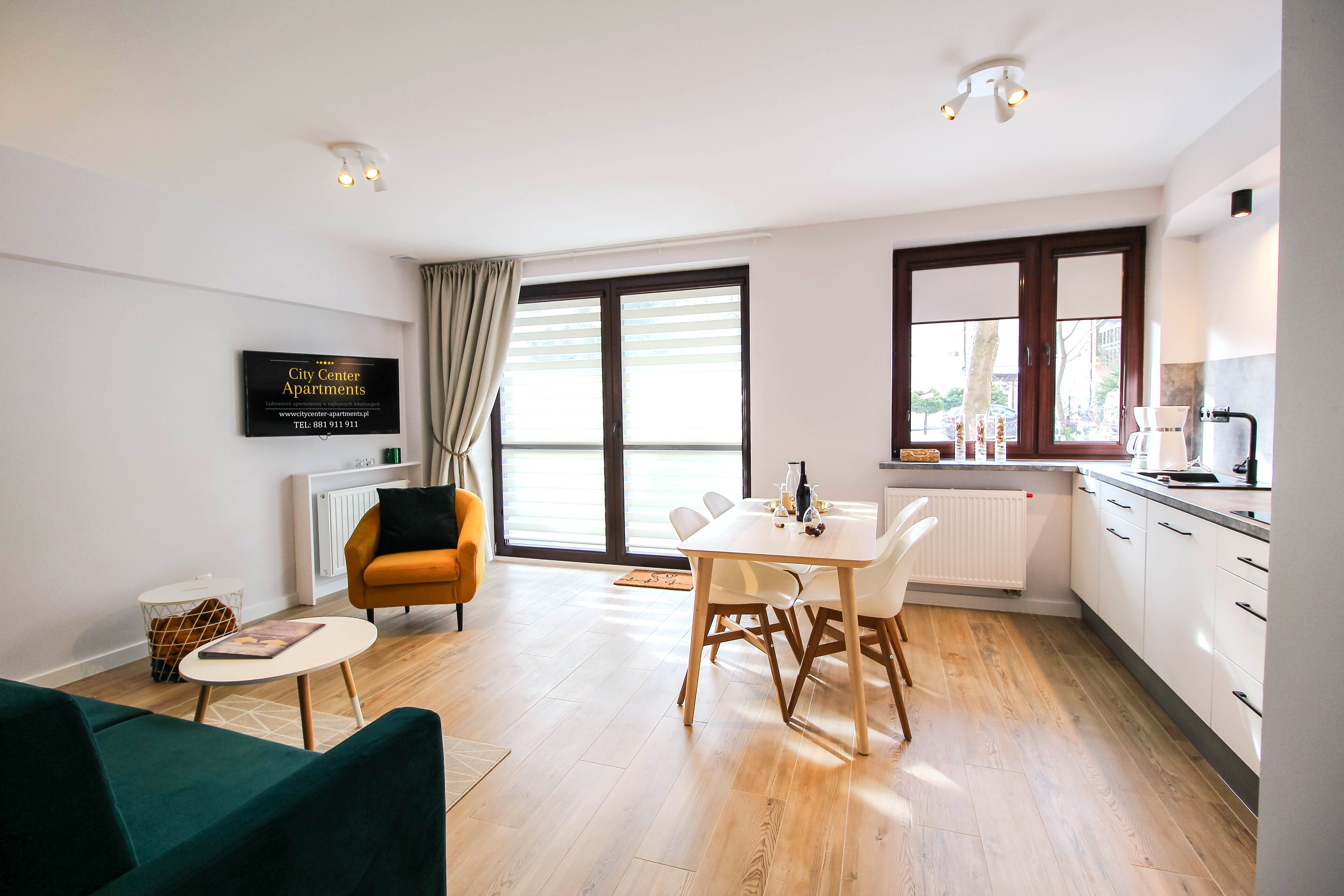 Comfort Apartment | Living area | Flat-screen TV