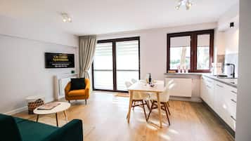 Comfort Apartment | Living area | Flat-screen TV