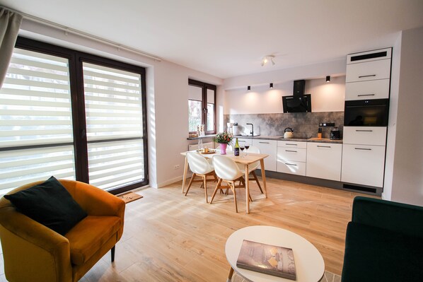 Comfort Apartment | Living area | Flat-screen TV