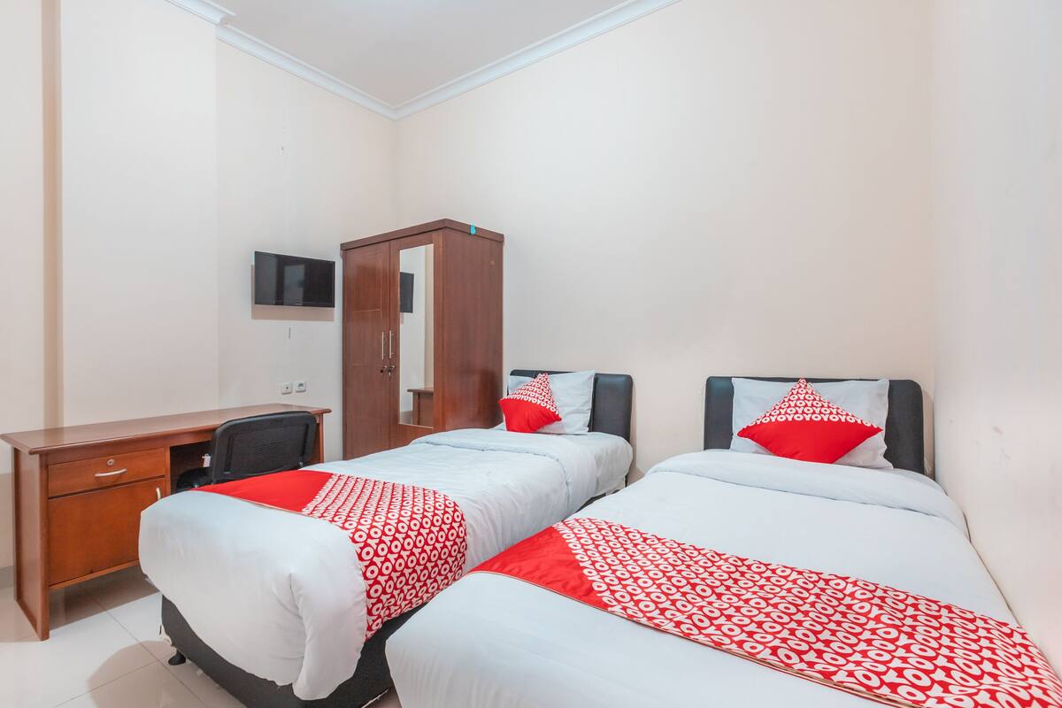 Habitación Deluxe con 2 camas individuales | Escritorio, wifi gratis y ropa de cama