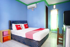 Deluxe Double Room | Desk, free WiFi, bed sheets - OYO 2343 Winolanto Guest House Syariah (Balikpapan)