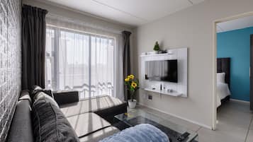 Standard Apartment, 3 Bedrooms | Living area | Smart TV, Netflix, streaming services