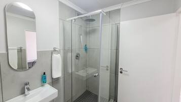 Superior Apartment, 1 Bedroom | Bathroom | Shower, rainfall showerhead, free toiletries, hair dryer
