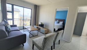 Standard-Apartment, 3 Schlafzimmer | Wohnbereich