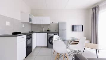Deluxe Apartment, 2 Bedrooms | Private kitchen | Mini-fridge, microwave, stovetop, electric kettle