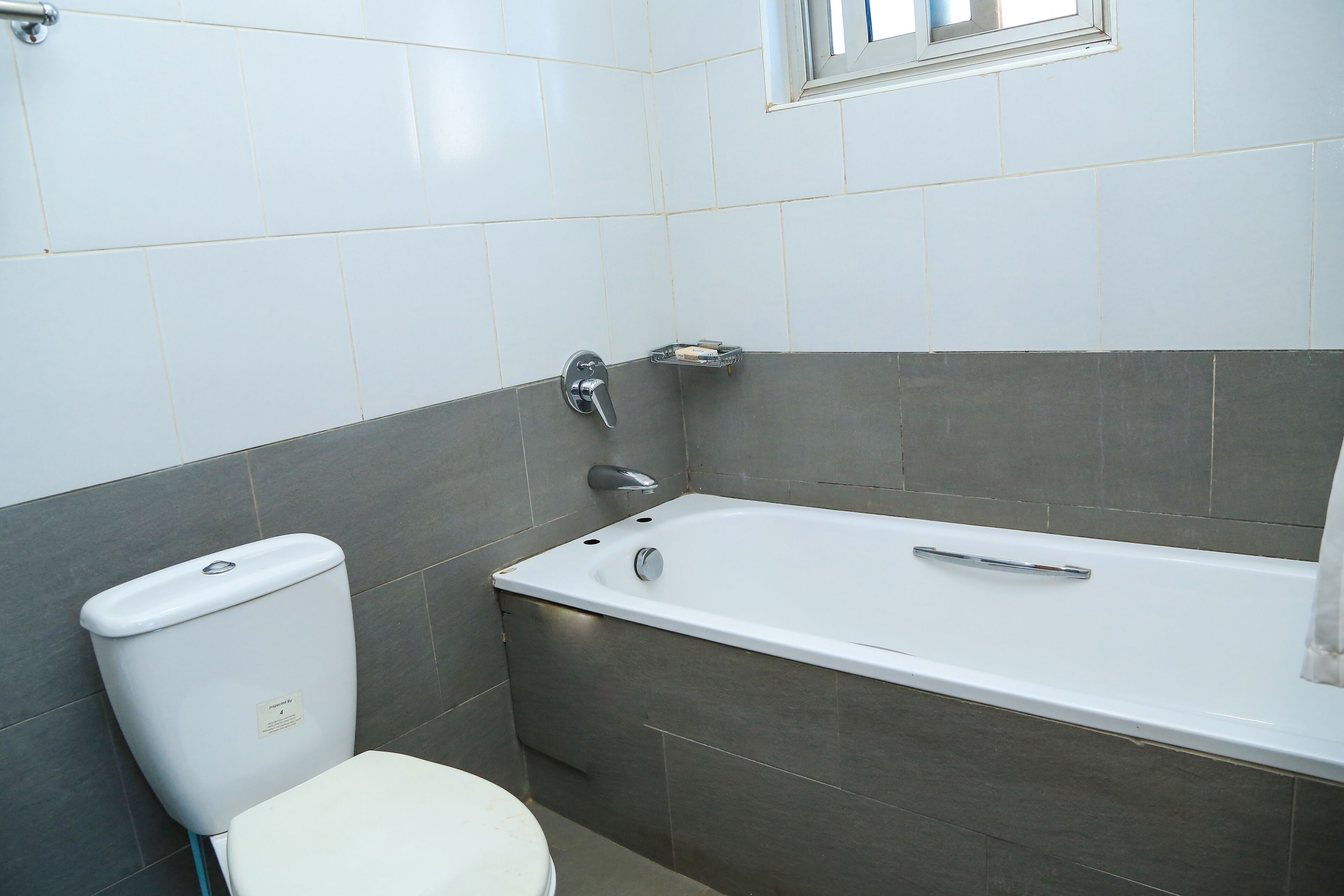 Combined shower/tub, towels, soap, toilet paper