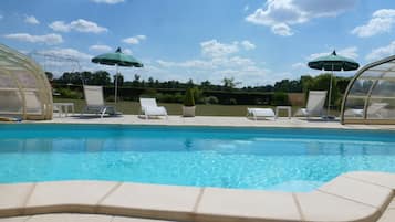 Seasonal outdoor pool, pool umbrellas, sun loungers