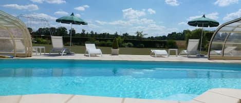 Seasonal outdoor pool, pool umbrellas, pool loungers