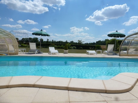 Indoor pool, seasonal outdoor pool, pool umbrellas, sun loungers