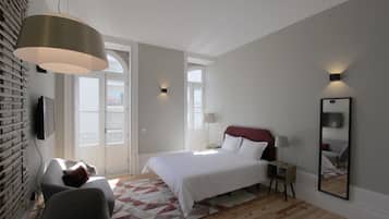 Departamento, 1 habitación (Duque de Braganca) | Área de sala de estar | Televisión de pantalla plana de 40 pulgadas con canales por cable