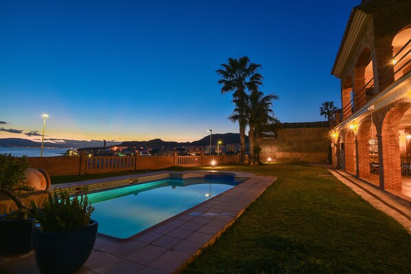 Outdoor pool, open 8:00 AM to 9:00 PM, pool umbrellas, sun loungers