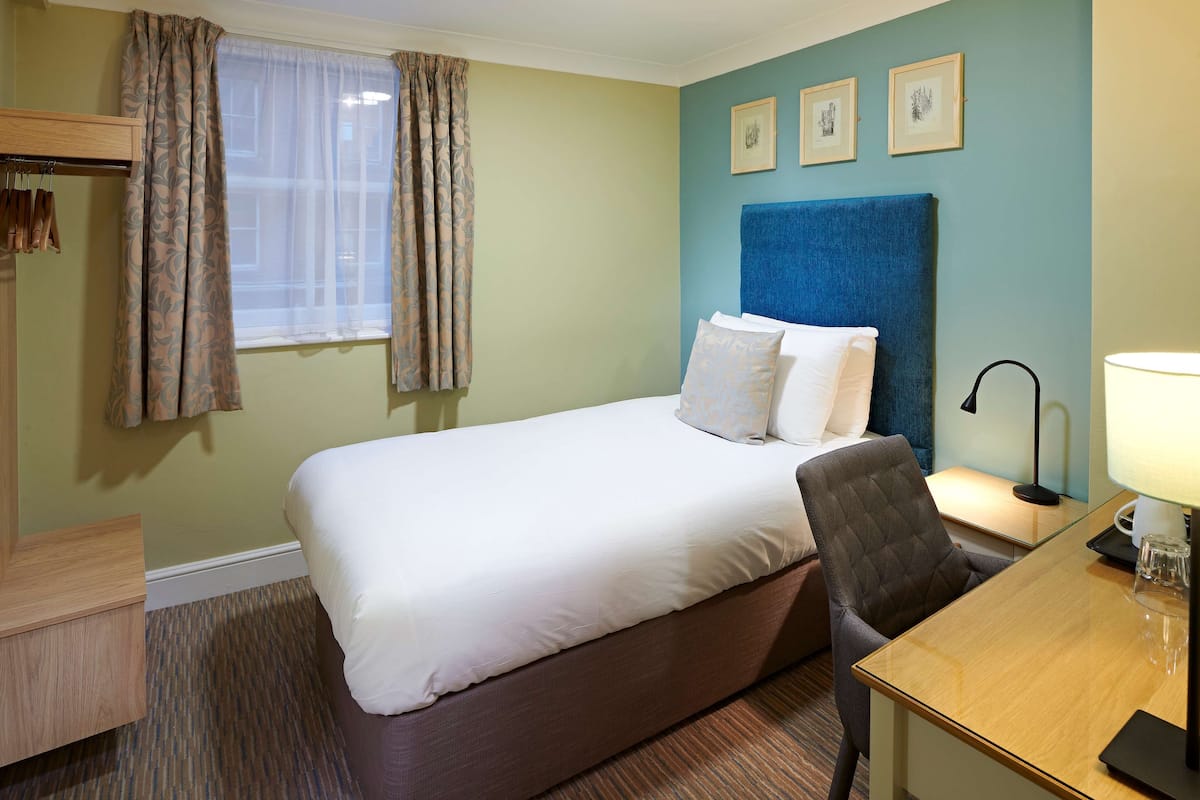 Hypo-allergenic bedding, desk, laptop workspace, iron/ironing board