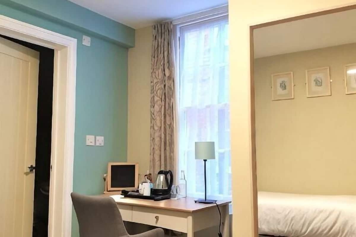 Hypo-allergenic bedding, desk, laptop workspace, iron/ironing board