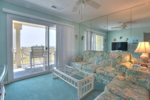 TV - Oceanfront 2BR condo in Caswell Beach, Oak Island—perfect for family getaways! (Oak Island)