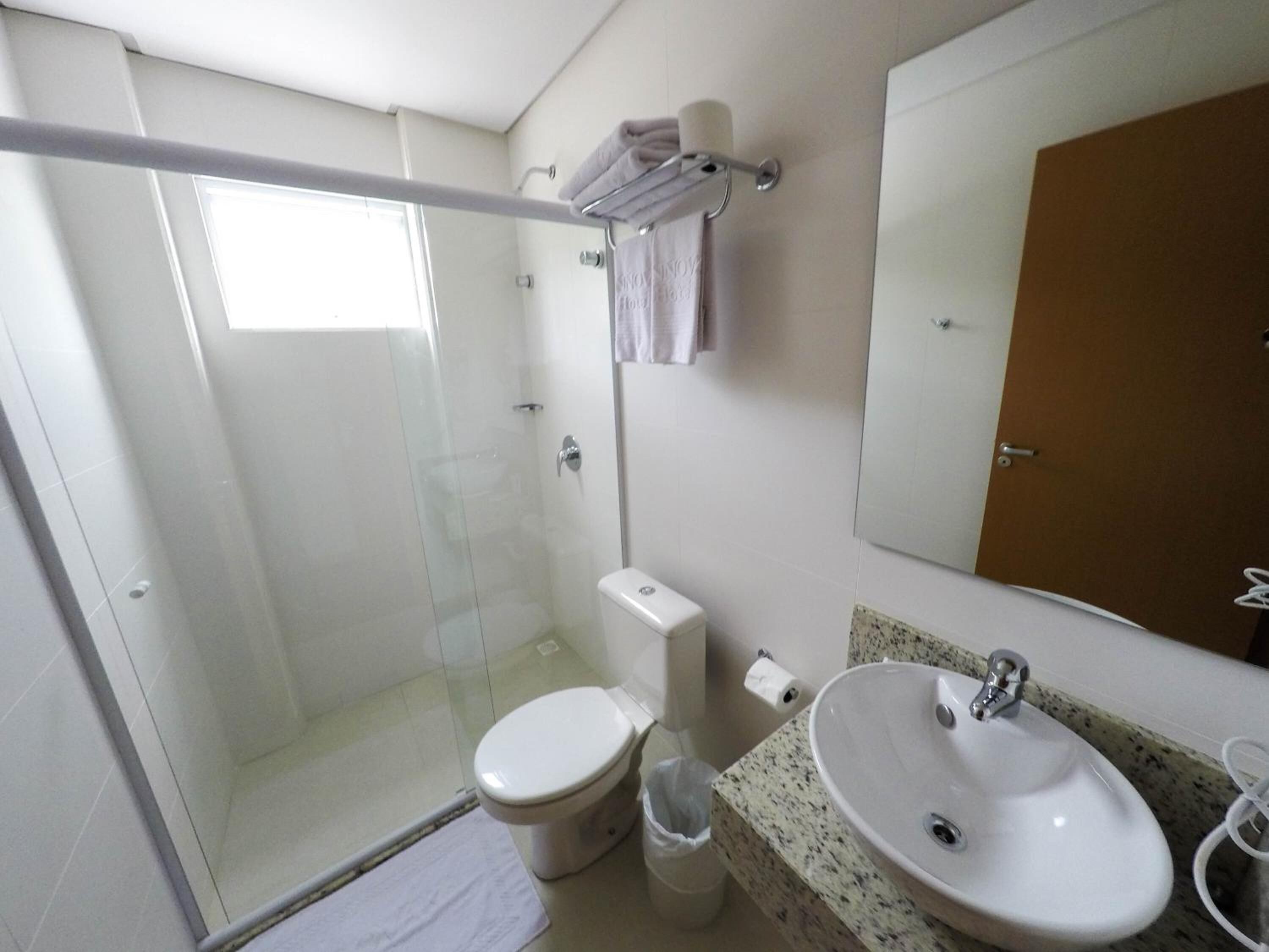 shower, rainfall showerhead, designer toiletries, hair dryer